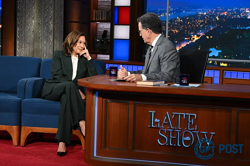 Imagem principal da notícia: Kamala Harris e Stephen Colbert: Uma Entrevista no Sombra de um Sistema Quebrado